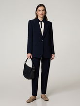 Bild von Poloshirt aus Strick