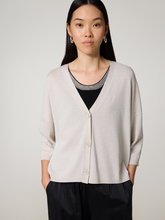Bild von Strickjacke mit Glitzer
