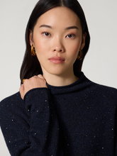 Bild von Strickpullover mit Glitzer