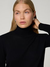 Image sur pull à col roulé
