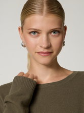 Bild von Strickpullover aus Wolle