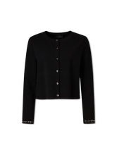 Bild von Strickjacke mit Nieten