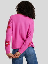 Bild von Strickpullover mit Blumen-Motiv