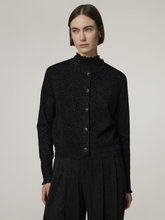 Bild von Strickjacke mit Rüschen