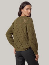 Bild von Pullover mit Strasssteinen