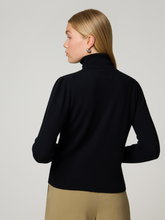 Image sur pull à col roulé