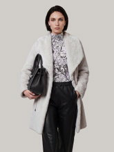 Image sur Manteau en fausse fourrure