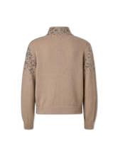Bild von Strickjacke mit Strassbesatz