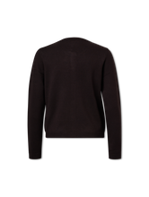 Bild von Strickjacke mit Strasssteinen