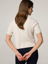 Bild von Poloshirt aus Strick