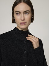 Bild von Strickjacke mit Rüschen
