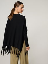 Bild von Strickponcho mit Fransen