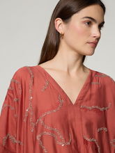 Bild von Tunikabluse mit Strasssteine