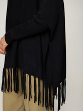 Bild von Strickponcho mit Fransen