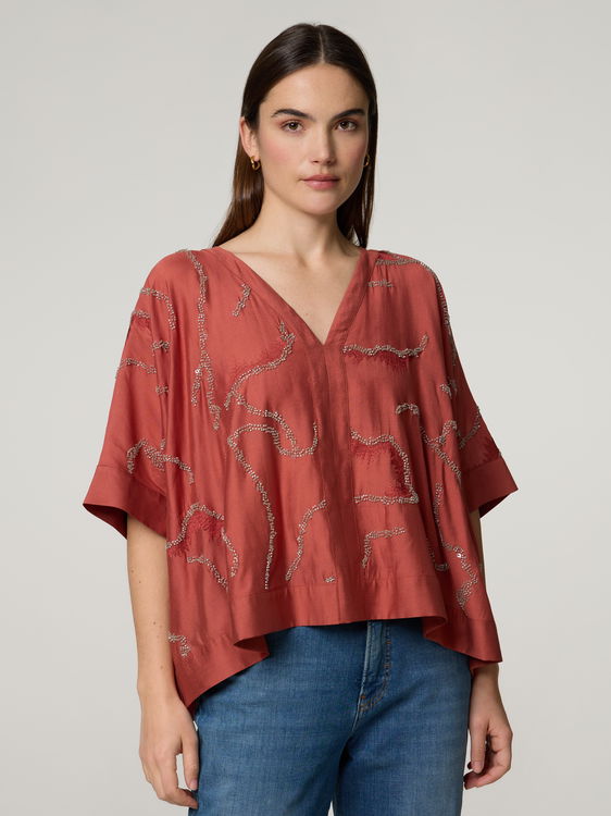 Bild von Tunikabluse mit Strasssteine