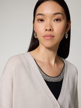 Bild von Strickjacke mit Glitzer
