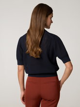 Bild von Poloshirt aus Lochstrick DYLAI