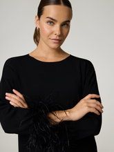 Bild von Feinstrickpullover mit Federn