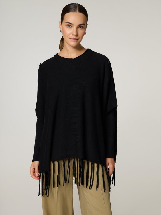 Bild von Strickponcho mit Fransen